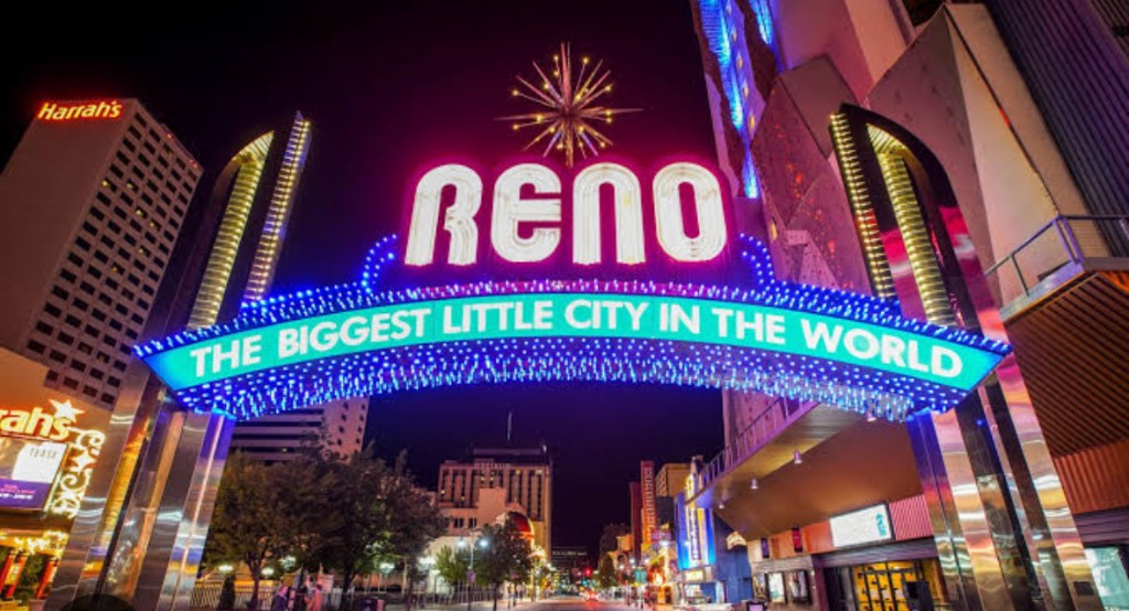 Downtown Reno arch at night — urban prism and park gateway